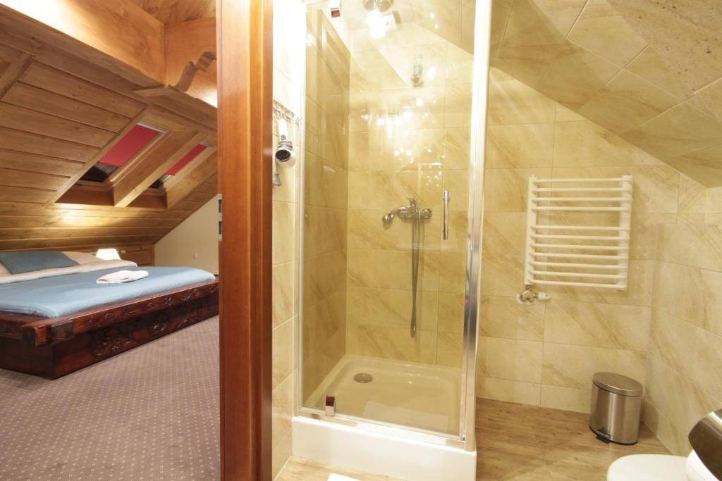 Фотографии номера Двухместный номер с 1 кроватью в  Dworek Pod Jodłami Закопане